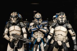 Detailed shot of Star Wars clone trooper action figures in combat-ready stance.